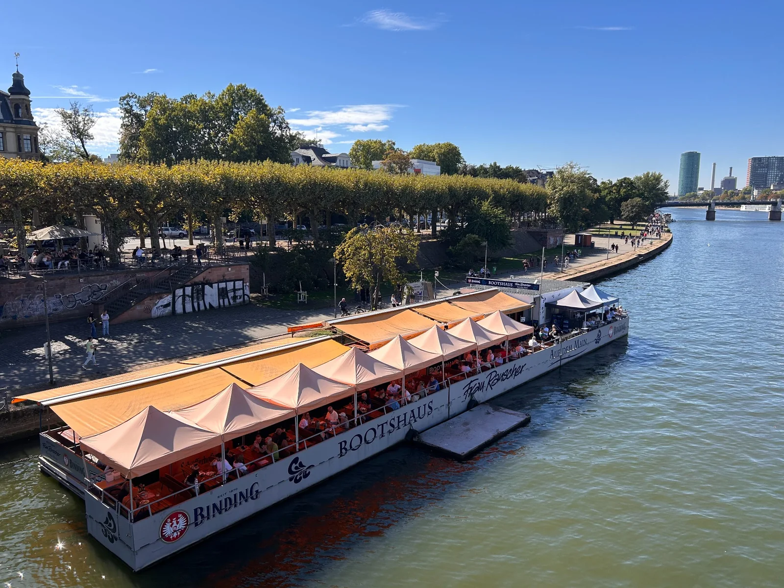 Floating Bootshaus Frau Rauscher restaurant on the Main beside the Sachsenhausen riverside promenade