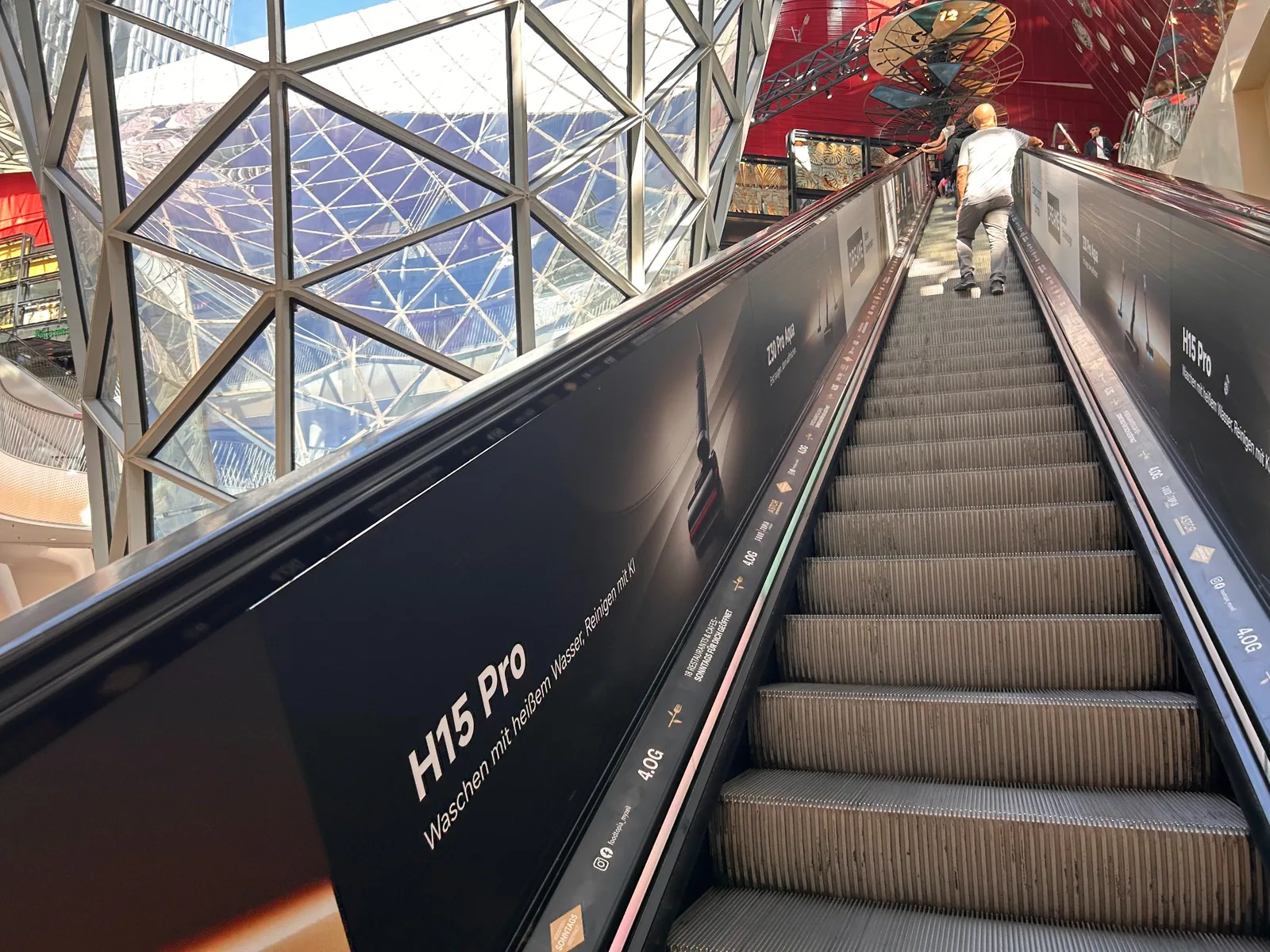 Escalator inside MyZeil alongside its geometric glass façade