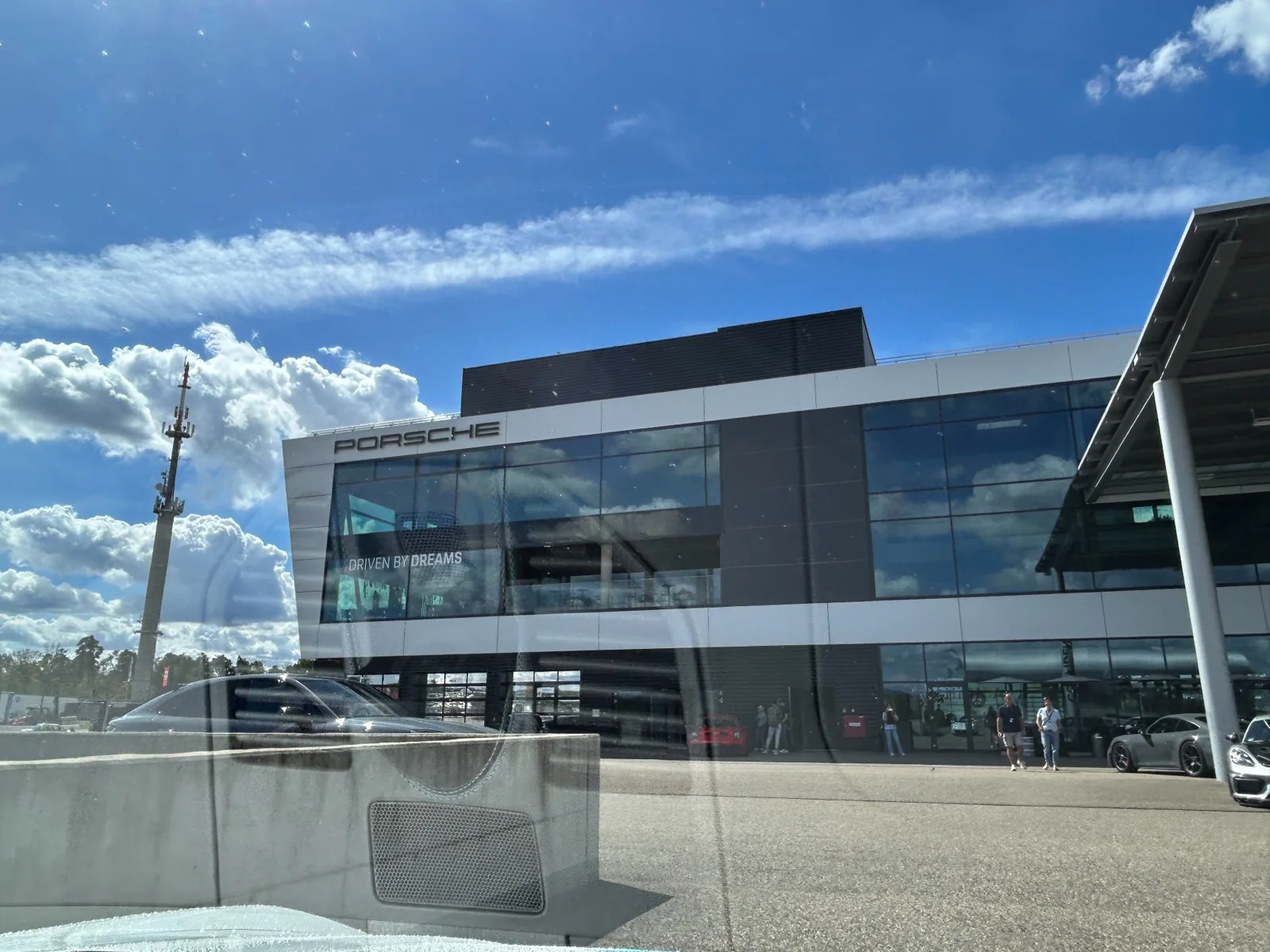 Glass facade of the Porsche Experience Center building at Hockenheimring