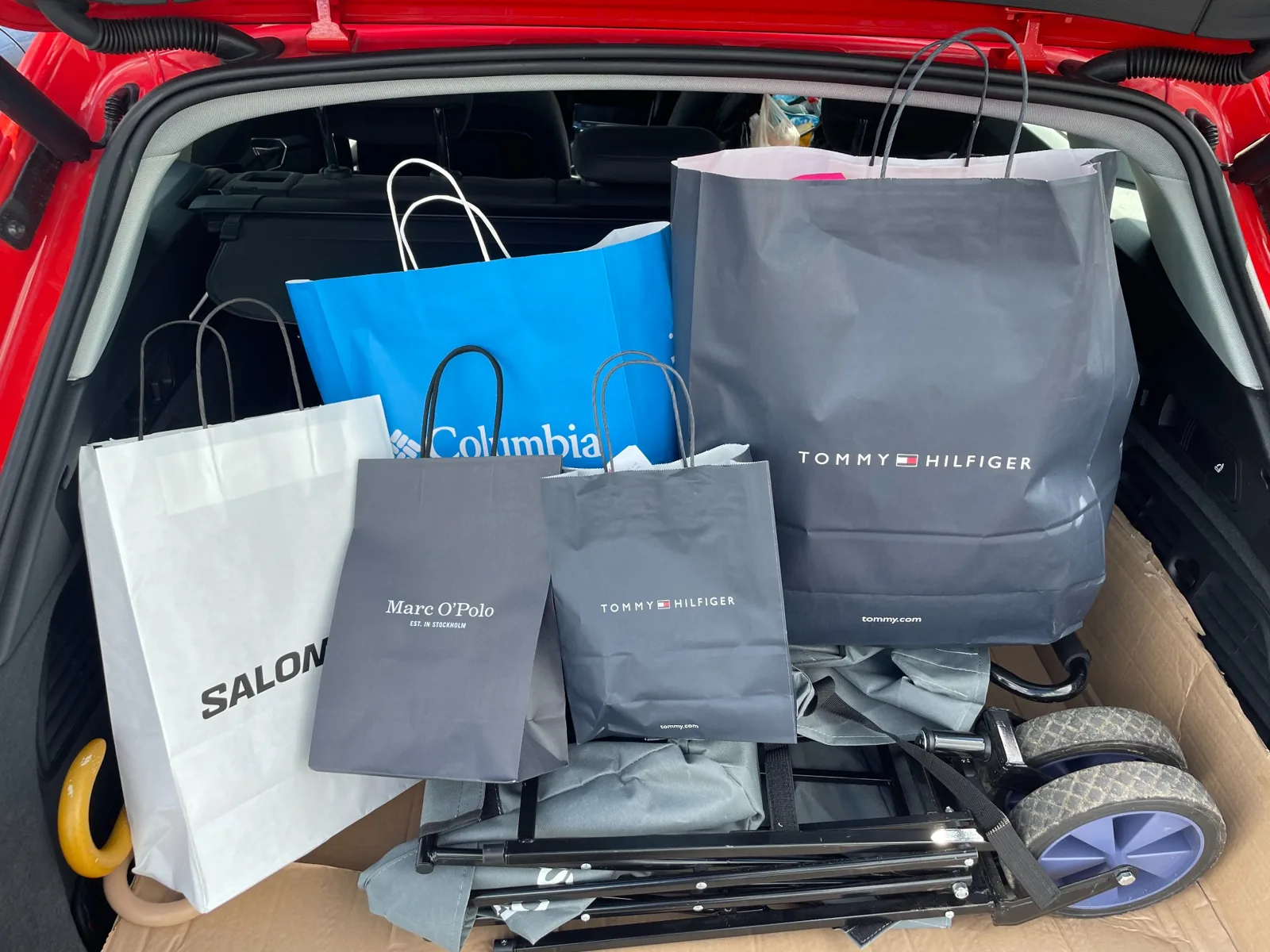 Shopping bags in the boot of a car after a visit to Wertheim Village